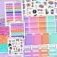 Collection of colorful planner stickers with various designs on a purple background.