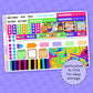 Colorful planner stickers with various designs on a purple background