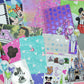 Collection of Disney-themed stickers and paper on a pink background