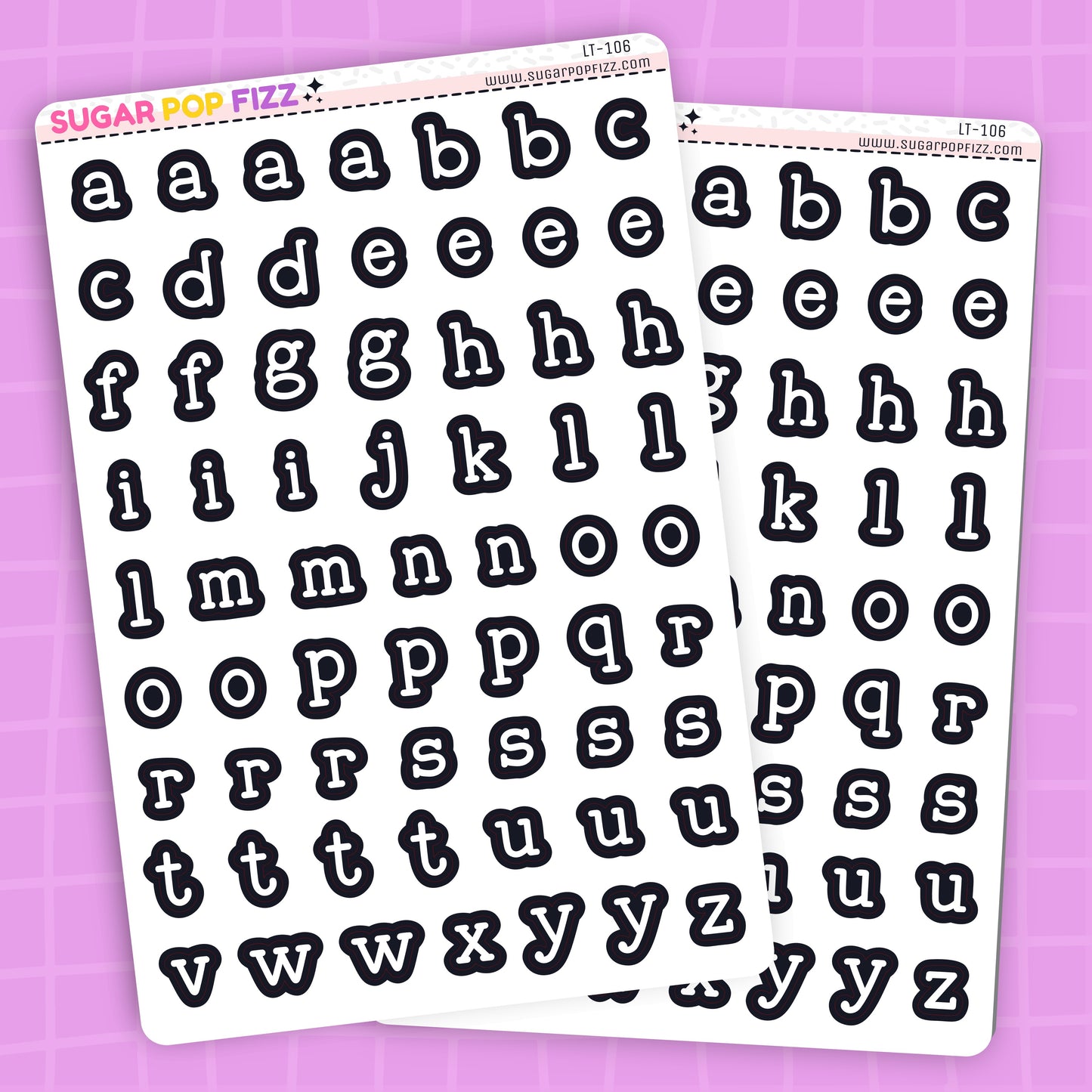 Two sheets of alphabet letter stickers on a purple background