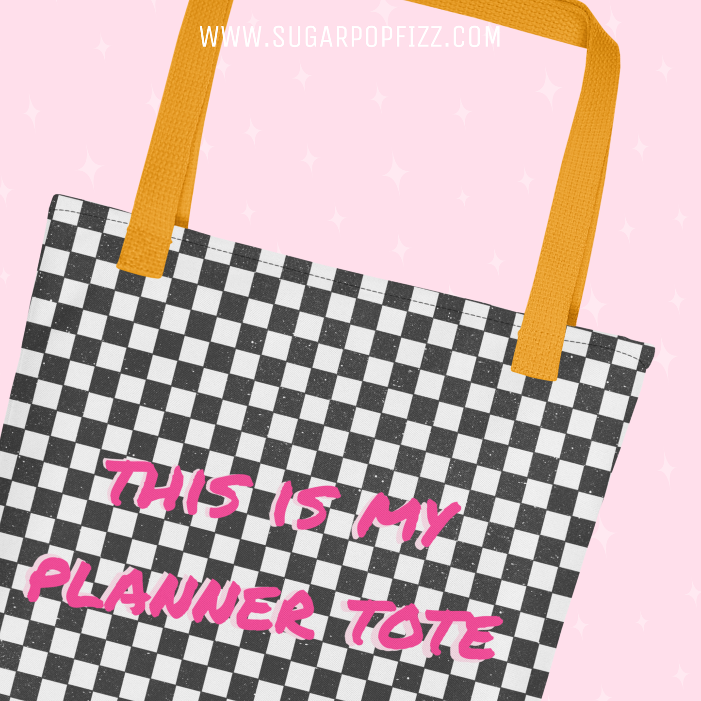 Checkered tote bag with pink text on a pink background