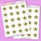 Two sheets of star-shaped stickers with glittery texture on a purple grid background.