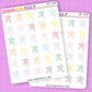 Two sheets of star-shaped stickers by Sugar Pop Fizz on a purple background.