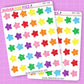 Two sheets of colorful star-shaped stickers by Sugar Pop Fizz on a purple background.