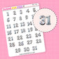 Sheet of silver metallic balloon number stickers one to thirty one on a ink background.