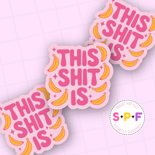 Pink stickers with 'This Shit Is' text and yellow bananas on a pink background, featuring the SPF logo.