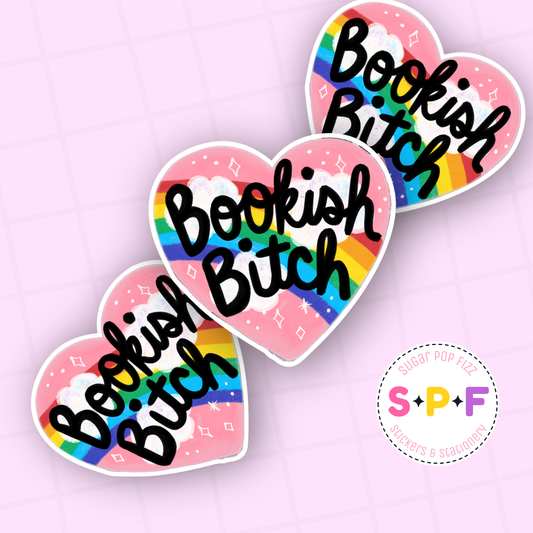 Heart-shaped stickers with 'Bookish Bitch' text on a pink background, featuring the brand 'S P F'.