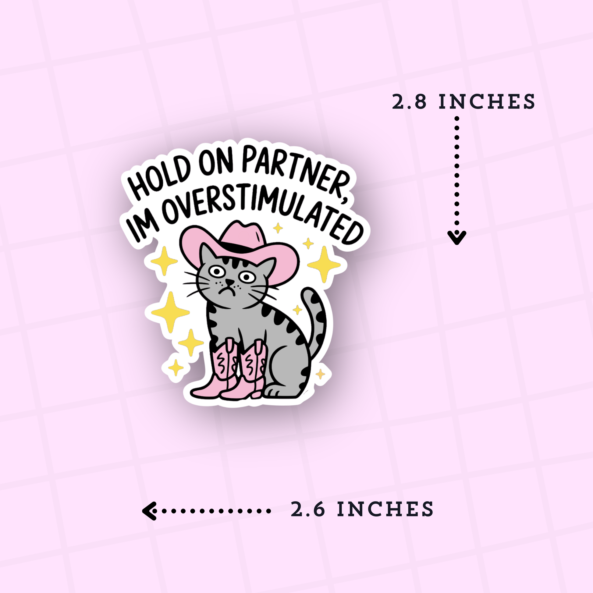 Sticker of a cat in cowboy boots with text 'Hold on partner, I'm overstimulated' on a pink background.