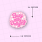 Pink sticker with 'Busy dilly Dallying' text on a light pink background