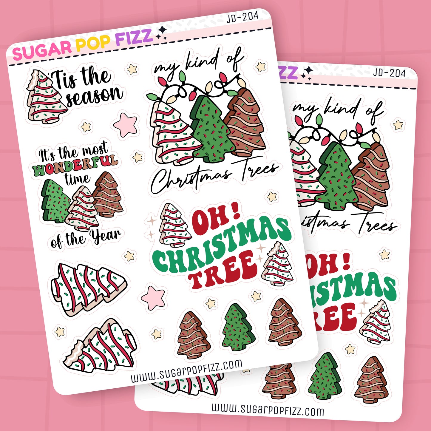 Two sheets of Christmas-themed stickers with decorative text and trees on a pink background.