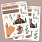 Two sheets of decorative stickers themed around taylor swift's evermore album with illustrations and text on a beige background.