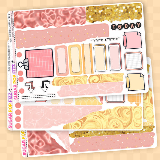 Decorative planner stickers with pink, gold, and marble patterns on a beige background