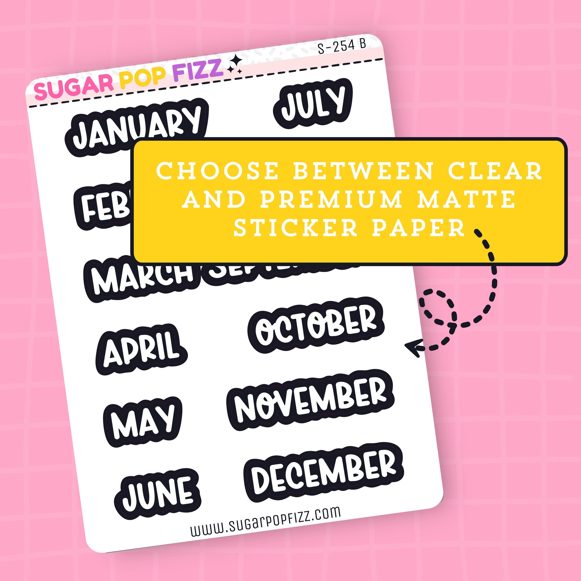 Sticker sheet with months of the year on a pink background, featuring text that states "choose between clear and premium matte sticker paper"
