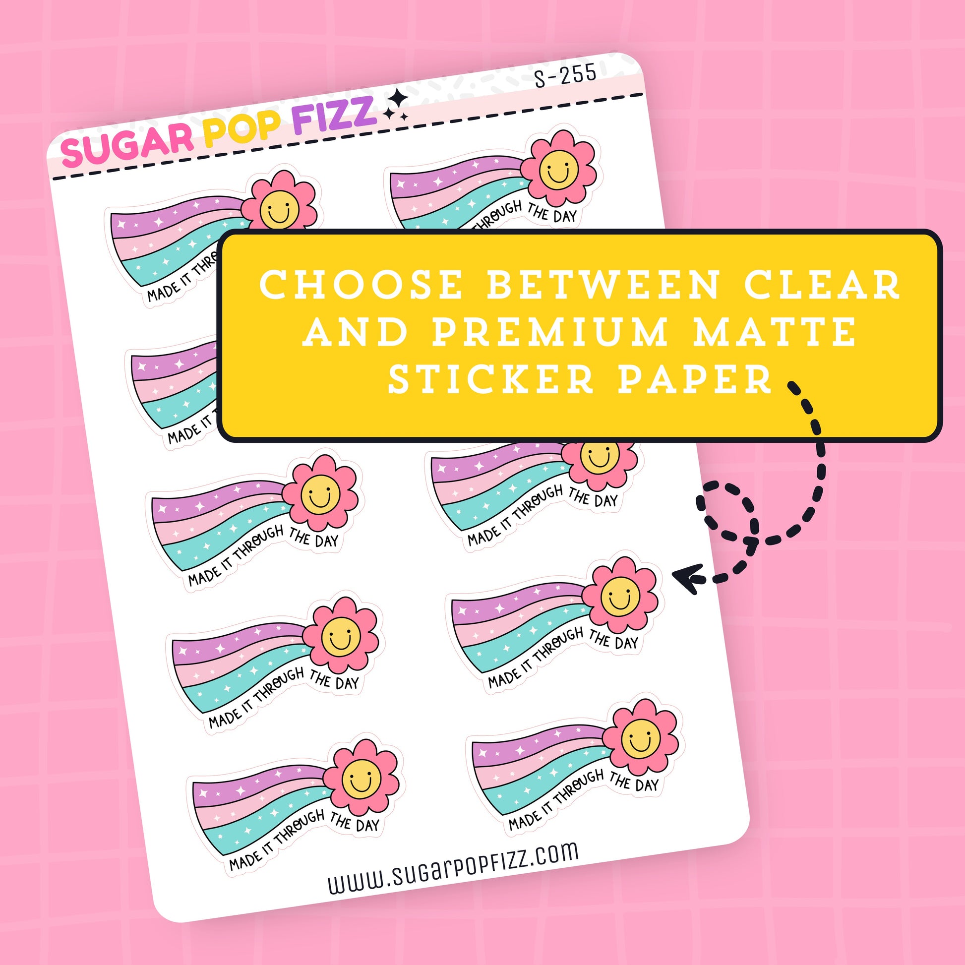 Sticker paper with rainbow-themed designs and flowers and text that says "made it through the day" on a pink background, featuring text about clear and premium matte sticker paper.