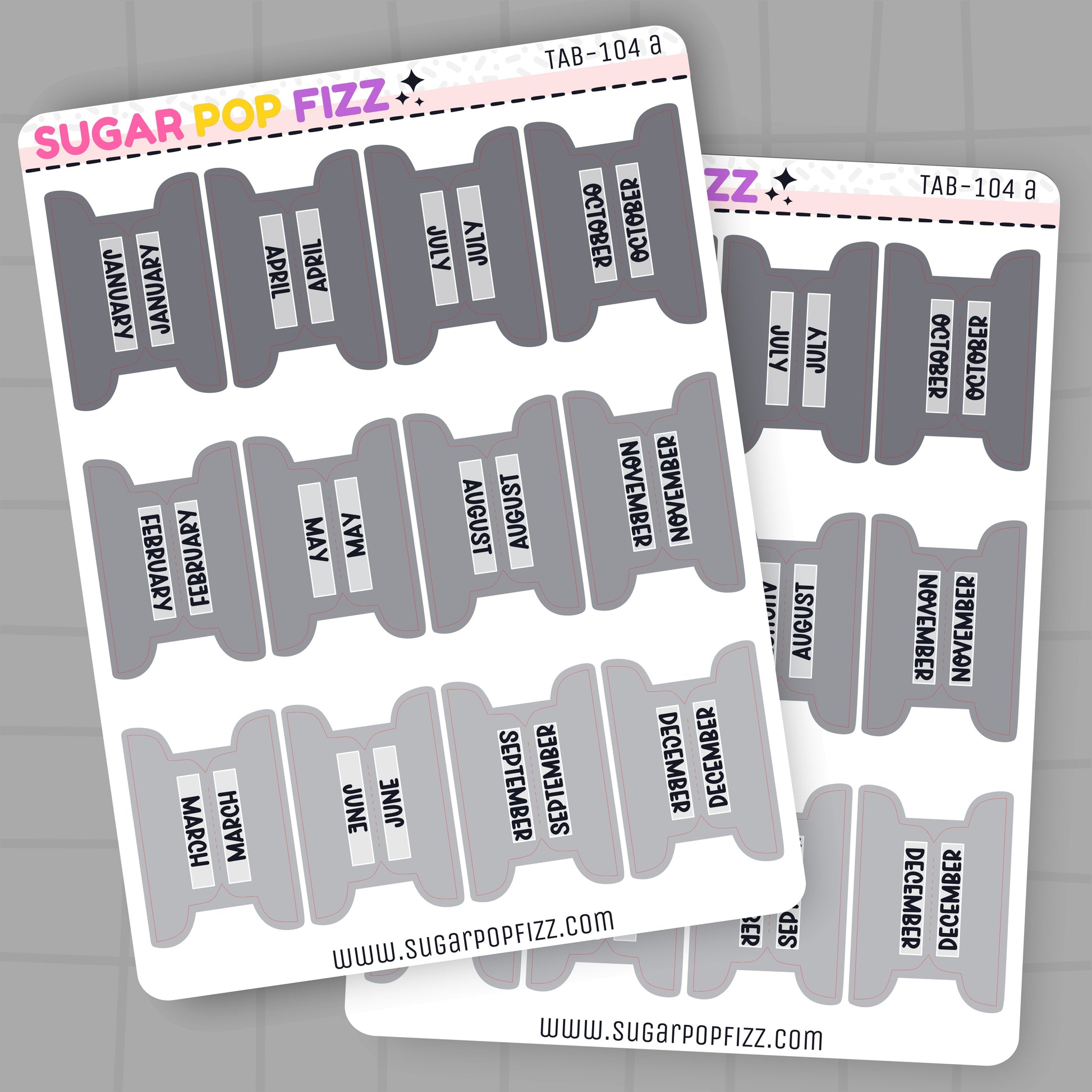 Sheet of planner stickers with months printed on them, branded 'Sugar Pop Fizz'.